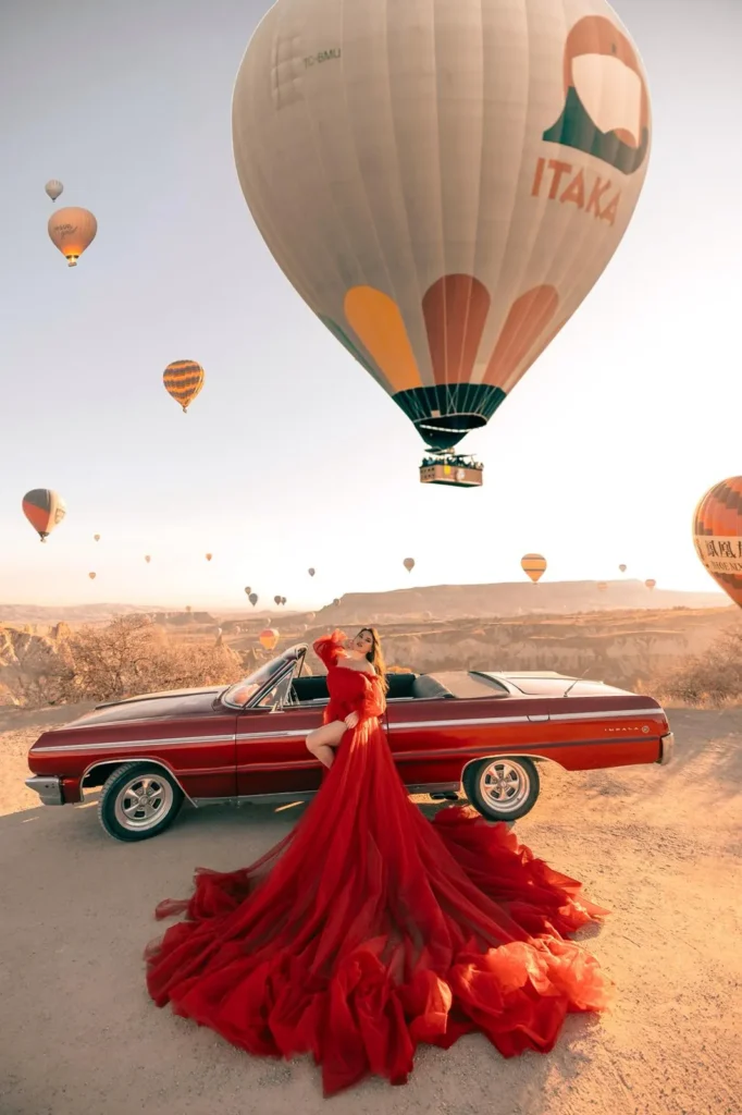 Woman wearing a flying dress for photoshoot in Cappadocia