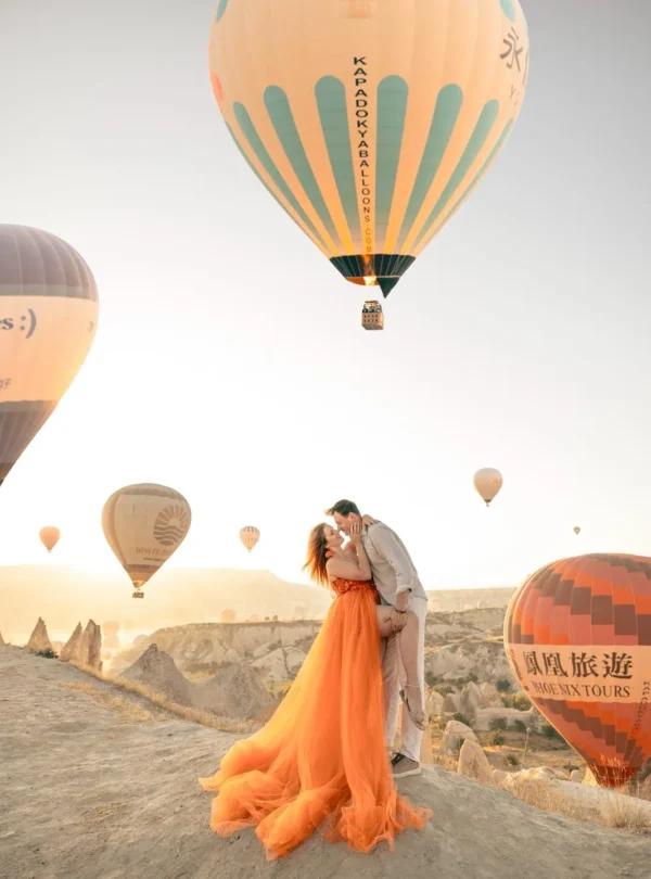 Professional Cappadocia photoshoot with hot air balloons at sunrise